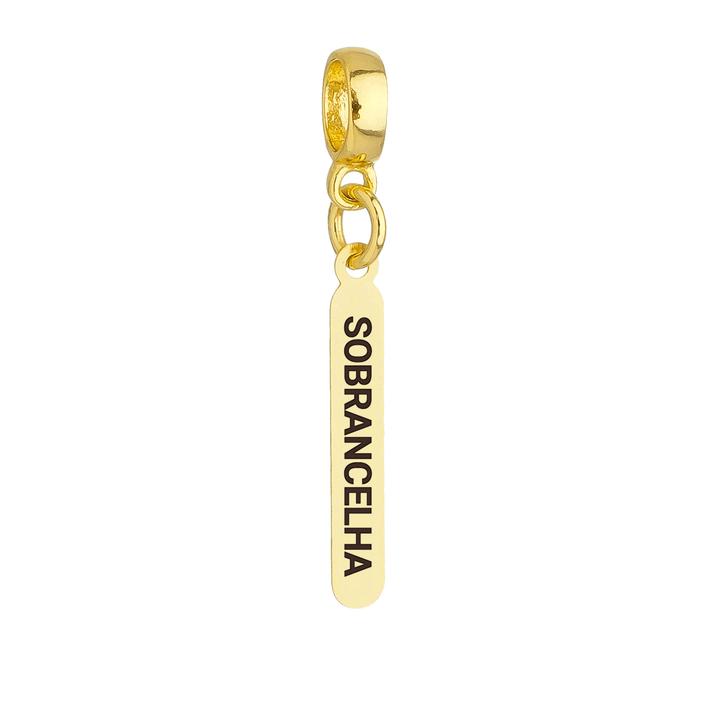 Berloque Plaquinha Sobrancelha dourado semijoia Work Semijoias
